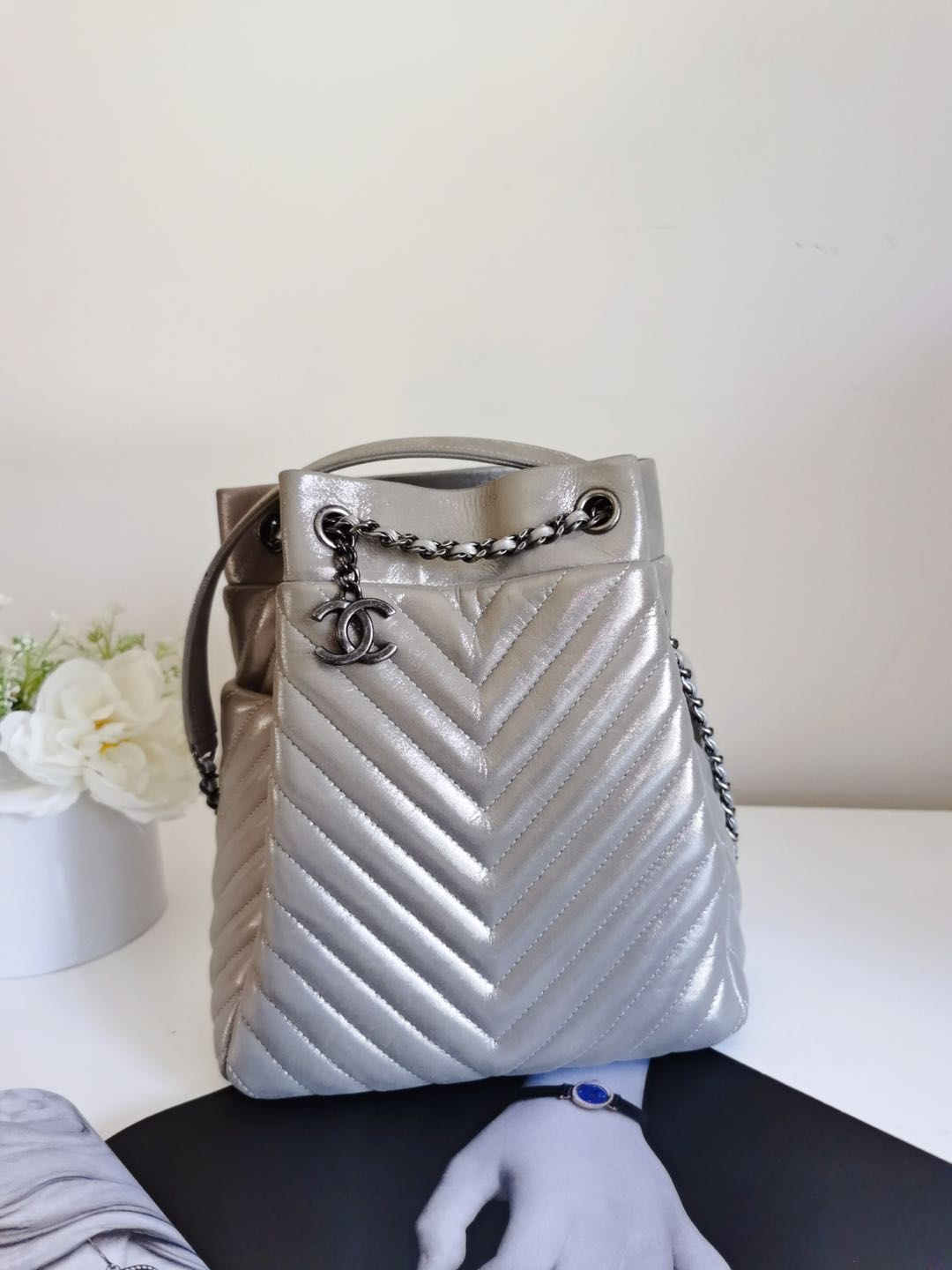 CHANEL SILVER METALLIC CHEVRON QUILTED CALFSKIN LEATHER SMALL BUCKET BAG - luxhub.ca