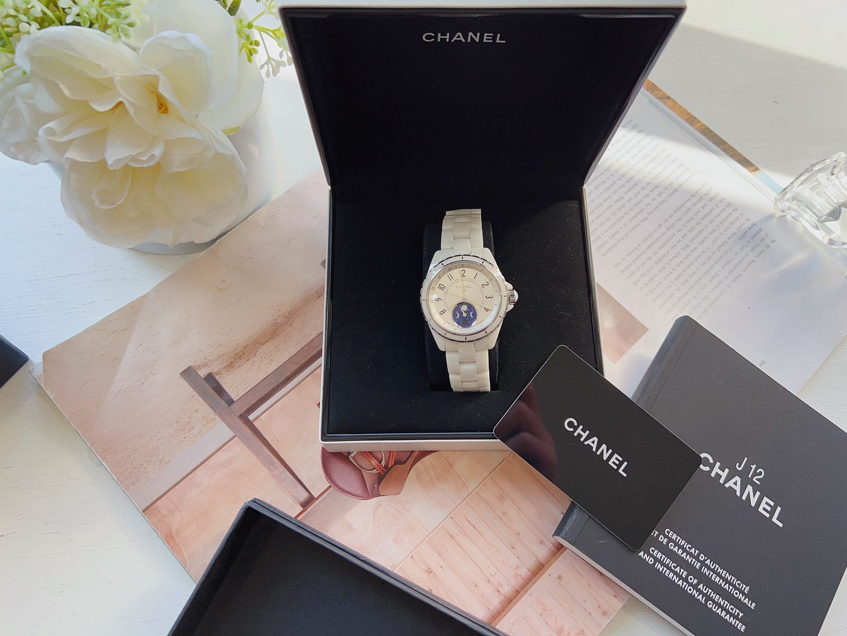 A Ladies Black Chanel J12 Wristwatch