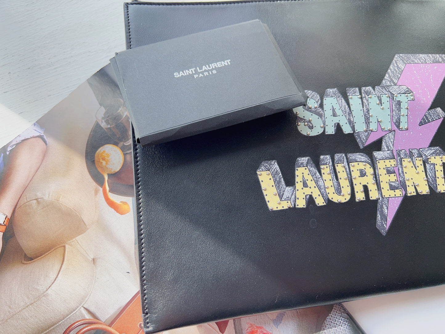 Saint Laurent Black Leather Rider Tablet Case. Black/Multicolor