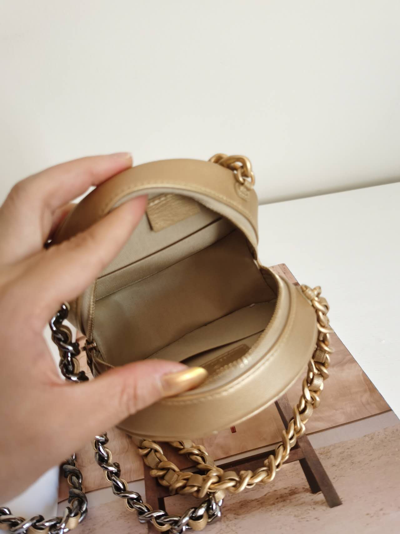 CHANEL Metallic Quilted Chanel 19 Round Clutch With Chain Gold - luxhub.ca