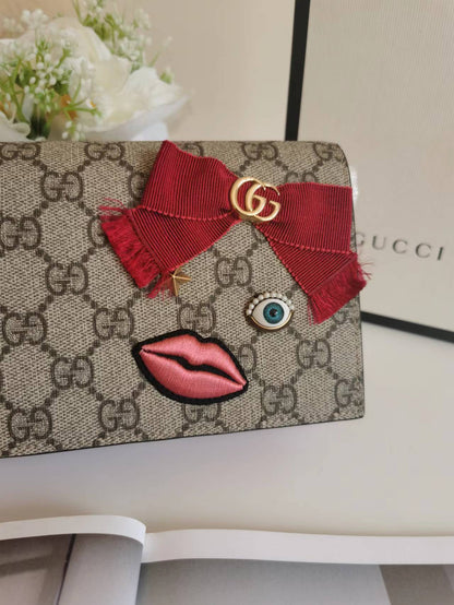 GUCCI GG Supreme Monogram Face Embroidered Chain Wallet Pink - luxhub.ca